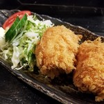 食助 - カニクリームコロッケ
            これ旨いっ！ソースかけずにこのままで十分♪