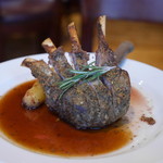 87835228 - Roast Rack of Connemara Lamb with a Mustard & Herb Crust served with Roast Mint Potatoes, Rosemary & Garlic Jus