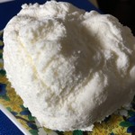 プラチノ - 銀紙とガーゼを開くと雪の塊のようなチーズケーキが