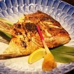 Grilled red sea bream helmet with sake and salt