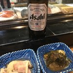 じろちょう - 突き出し玉ねぎとベーコンの煮物と昆布とサツマイモの煮物(o^^o)