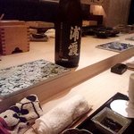 さえ喜 - 写真手前にあるのが、イカそうめん　麺つゆが掛っており、ウニとのオクラをすり潰した物と一緒に頂きます。