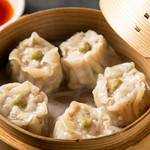 Handmade shumai made with pork and Seafood (five pieces)