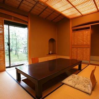 Looking out over the garden from a spacious sukiya-style tatami room