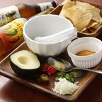 Homemade fresh avocado guacamole served with nacho chips