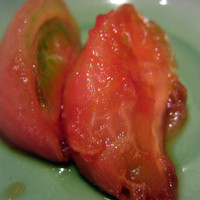 三田ばさら 本店 - トマトすき焼き　一皿目は半分火を通したトマト