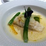 レストランひらまつ - スズキのポワレ　若々しい季節野菜のポタージュと一緒に