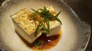 tempurakaisenkomefuku - お通しとして湯豆腐が運ばれてきました。