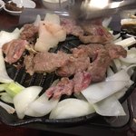 大衆中遊華食堂 八戒 - ジンギスカン焼き焼き風景