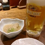 北前居酒屋 佐勘 - ドリンク写真:生ビールとお通しのとうがん