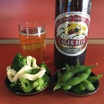 久華 - 瓶ビールとサービスお通し2種