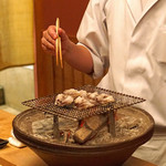 緒方 - 京都府宮津のトリ貝を炙ってます