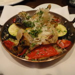 クッチーナ イタリアーナ ガッルーラ - つぶ貝（北海道産の真つぶ）と夏野菜のインデバッラ（オーブン焼き）