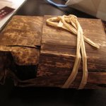 鮨まつい - 竹皮に包まれた太巻き