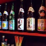 沖縄料理 うぶすな - 沖縄のお酒が並びます