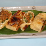 Kinchaku-yaki of natto and okra - traditional country taste - natto and okra with seasoning added to the deep-fried tofu, grilled to a fragrant aroma