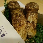 Matsutake mushrooms steamed in a clay pot