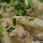 炭火焼酒亭ローリンストーン - いぶりがっこポテサラ　ズームアップ