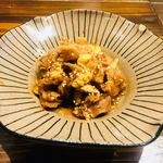 萬的中華 笑龍 - モツの甘辛煮。