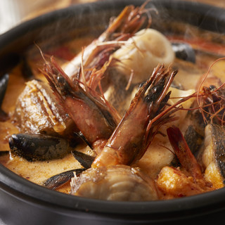 Enjoy our specialty ``Bouillabaisse'' that gently soothes your tired body.