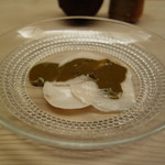 緒方 - ◎生黒鮑に肝ソース（すだちに山葵を少しブレンド）