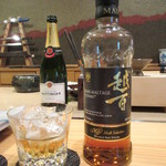 照寿司 - 空けたテタンジェのボトル(14500円)と越百のロックを1杯(3300円)