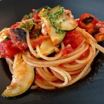 タントタントトラットリア - タコとズッキーニのトマトソース