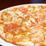 Shrimp and smoked salmon cream cheese pizza