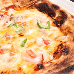 Seafood pizza with lots of ingredients