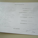 カンテサンス - 食後にもらったメニュー（シェフのサイン入り）