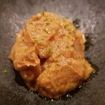 鮨 さかい - 肴⑩鮟肝(北海道余市産)、刻んだ奈良漬と浸けた酒粕入り
      裏漉しの鮟肝と細かく微塵切りした奈良漬、滑らかクリーミーでコクがあり、シャキとした食感も楽しめる逸品です