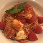 Tomato sauce pasta with mozzarella cheese and basil