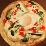 Gooey soft-boiled egg and tuna pizza