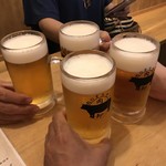 大衆酒場肉のオカヤマ - 金麦で乾杯！