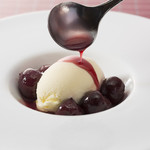 Vanilla ice cream with red cherry juville sauce
