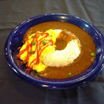 ブラジル - オムカレー　特製カレーソースがオムレツとベストマッチ