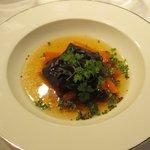 シャトン - 海老だしのかかったシーフードいっぱい～イカスミ生地の自家製ラビオリ♪