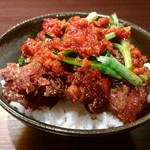 Karamen Hanabi - 究極のまかない丼。豚軟骨をカリカリに焼いて、オリジナルの旨辛ソースをかけた絶品丼。