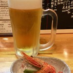 肴やのんき - 「SAPPORO生ビール(中)」550円と、お通し