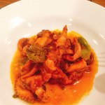 ヴェッキオ コンヴェンティーノ - 真蛸と甘唐辛子のピリ辛トマト煮込み サルサヴェルデがけ  800円
