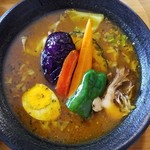 スープカレーハウスしっぽ - グリルドチキンカレー(黒糖入り)辛さ30のカレーアップ