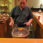 日本料理 たかむら - 朝締め比内地鶏の首皮包み焼き1