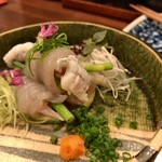 鳥田中 - お通し（虎河豚のネギ巻き？）