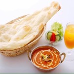 All curry sets come with naan or rice, salad and soft drink!