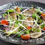 Smoked sea bream carpaccio with anchovy sauce