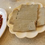 王少龙火锅 - 白做黒豆腐