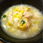 炭火焼鳥ていじ - 鳥雑炊を小鉢に移した