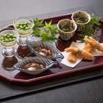 Beautiful ``Hassun'' where you can see the change of the seasons in each dish.
