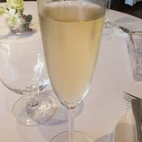 リストランテKubotsu - 食前酒に、スパークリングワインのフルーツカクテルをいただきました。　