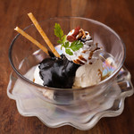 Vanilla ice cream with black sesame sauce